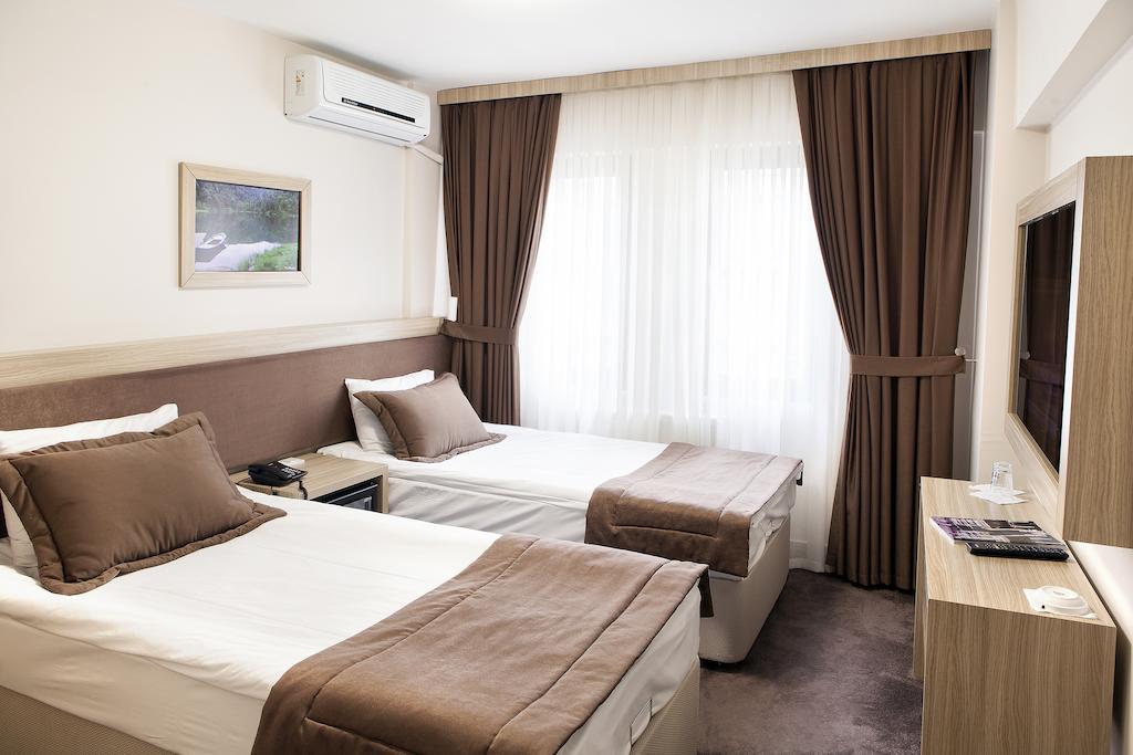 Hotel Emge Istambul Quarto foto